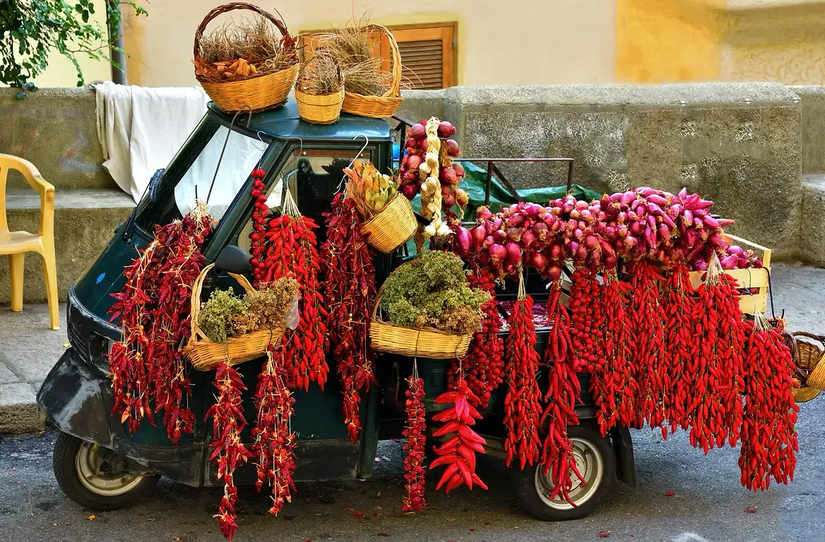 An “ape” truck laden with Calabrian produce.